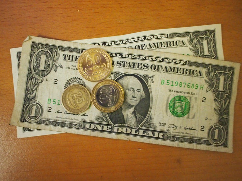 US Dollars and East Timor centavo coins