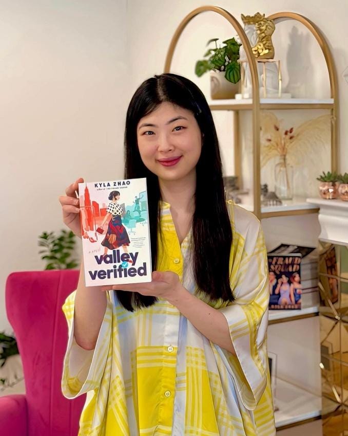 A person holding a book

Description automatically generated