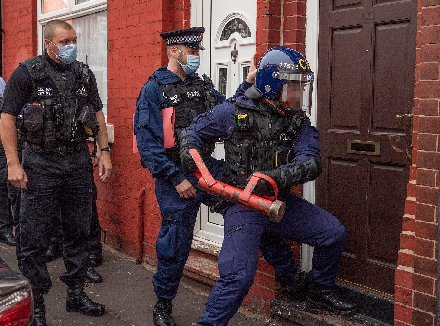 Police raid addresses in Cheetham Hill as part of firearms ...