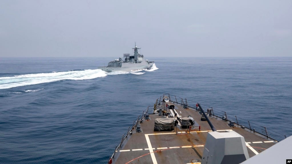 In this photo provided by the U.S. Navy, the USS Chung-Hoon observes a Chinese navy ship conduct what it called an "unsafe” Chinese maneuver in the Taiwan Strait, June 3, 2023. (Mass Communication Specialist 1st Class Andre T. Richard/U.S. Navy via AP)