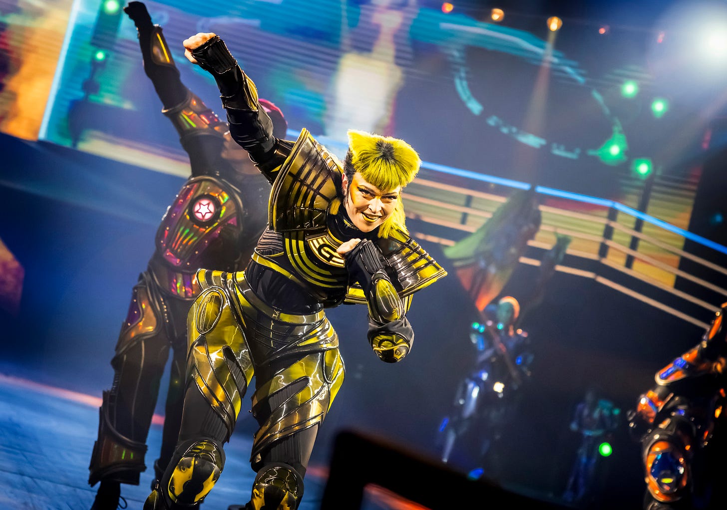 A photo showing Greasball in Starlight Express in a futuristic yellow and black train outfit