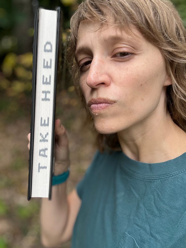 Four photos of Sooz with The Executioners Three in front of the first autumn leaves of the season. In the first photo, she's smiling, in the second she's looking goofily afraid, in the third she's showing the printed edges that read Take Heed, and in the fourth, she's showing the gorgeous end papers that show the full color map