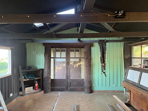 interior photos of an old log cabin with vertical board lining