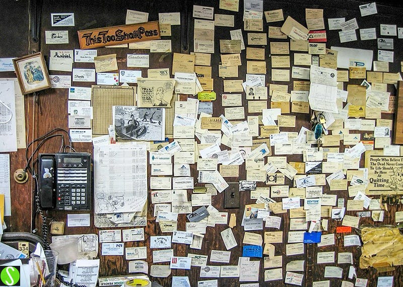 2007 Photo by steve Butcher of business cards on old school notice board