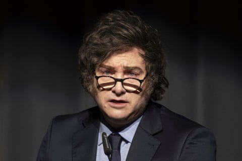 a man in a suit speaks a man in a suit speaks