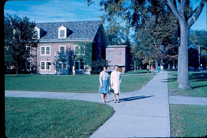 Two women, a mom and her daughter on a college campus