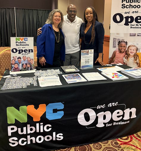 Left to Right: a man at a microphone, two women and a man at table that says nyc public schools, open for business, a man at a microphone on a podium