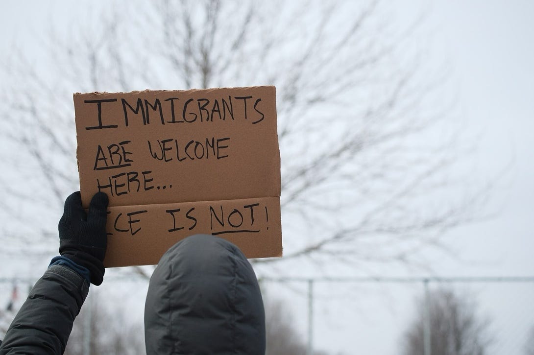 A person holding a sign

AI-generated content may be incorrect.