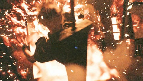 Perspective shift and time jump from Zack opening the door to Cloud being thrown backwards from the blast.