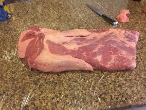 Brisket being trimmed