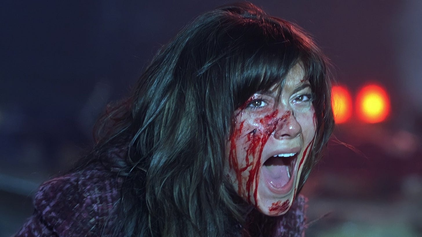 Mary Elizabeth Winstead screaming, face covered in blood