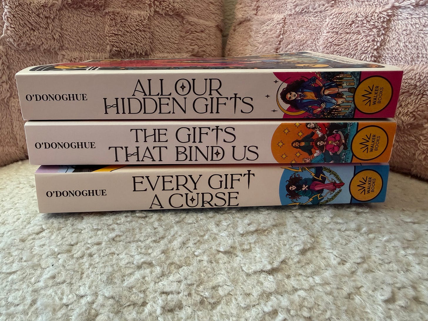 A stack of the Gifts series book spines by Carolyn O'Donoghue A stack of the Gifts series book spines by Carolyn O'Donoghue
