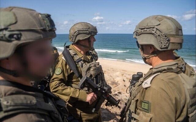 IDF Chief of Staff Lt. Gen. Eyal Zamir (center) is seen on Gaza's coast in the Netzarim Corridor area south of Gaza City, October 5, 2025. (Israel Defense Forces)