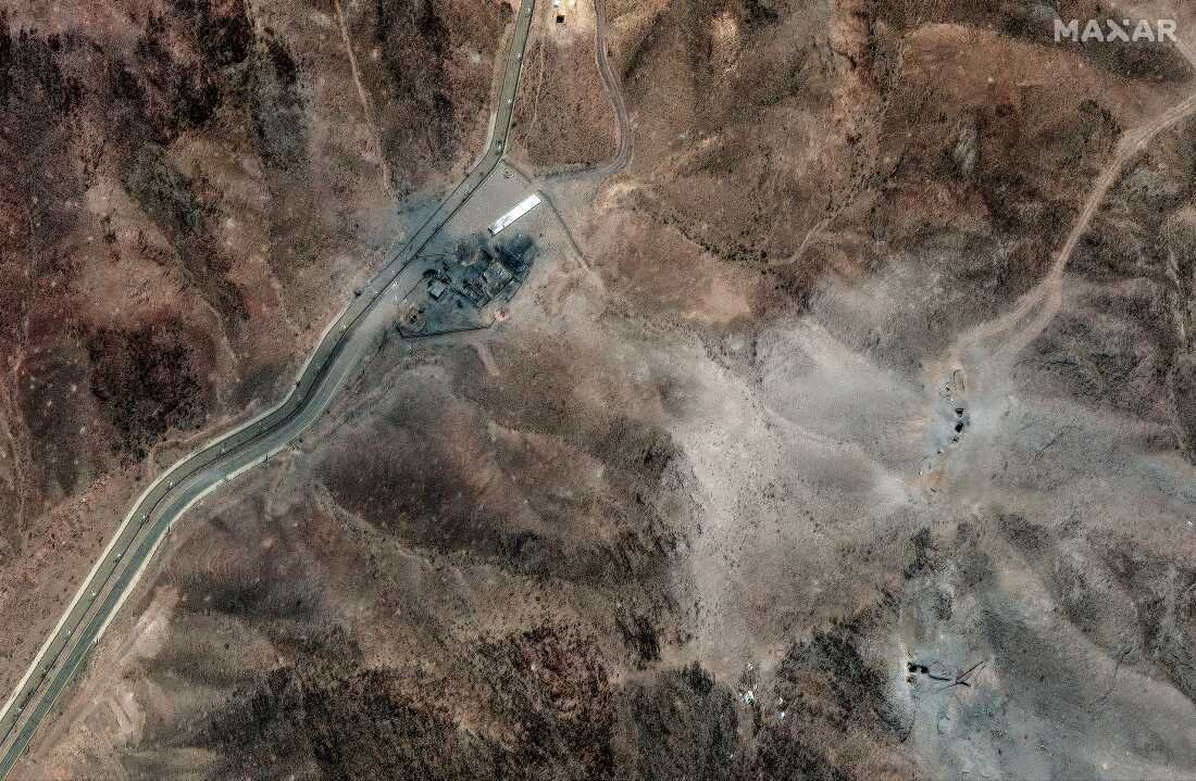 A satellite image of Iran's Fordo nuclear site shows clusters of new holes likely caused by U.S. bunker buster bombs dropped over the weekend following orders by President Trump. A satellite image of Iran's Fordo nuclear site shows clusters of new holes likely caused by U.S. bunker buster bombs dropped over the weekend following orders by President Trump.