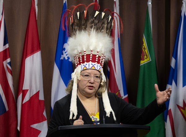 Air Canada reviewing policies after removal of national chief's headdress  from cabin - The Globe and Mail