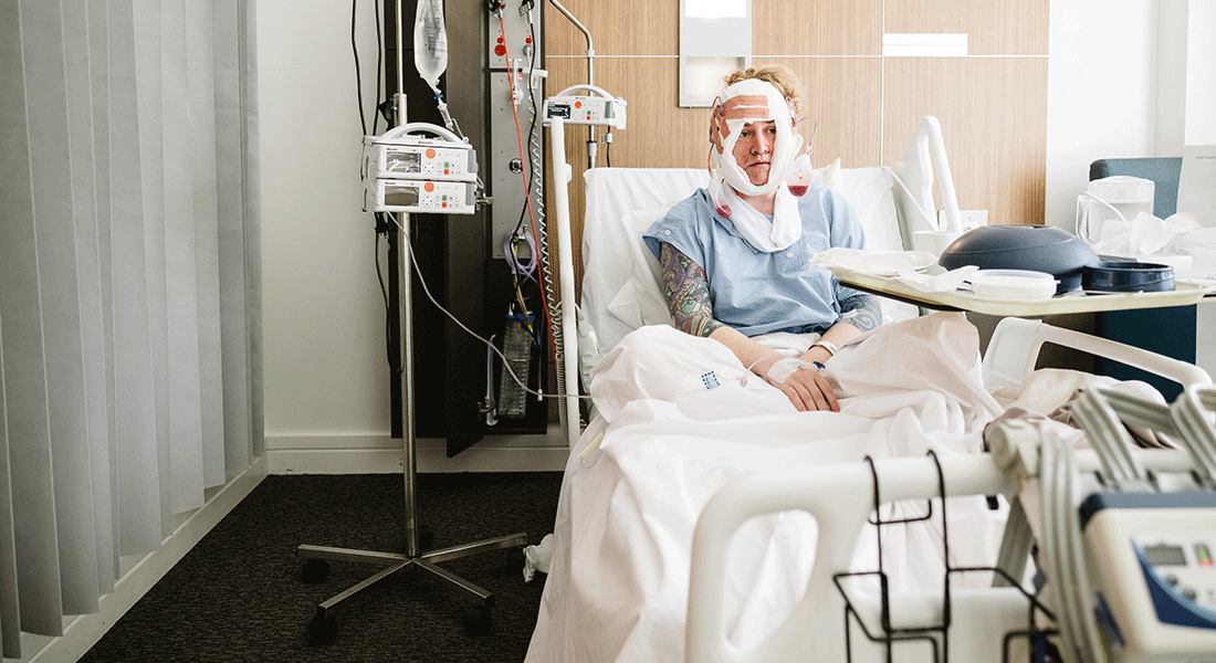 [I'm in bed, still wrapped from surgery the day before. I look like shit]