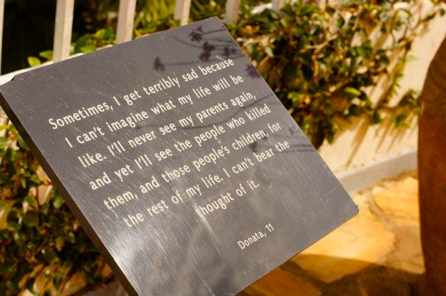 Photo of a plaque at the Kigali Genocide Memorial Museum. Photo of a plaque at the Kigali Genocide Memorial Museum.