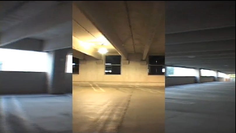 three separate shots tracking through an empty parking garage play side by side