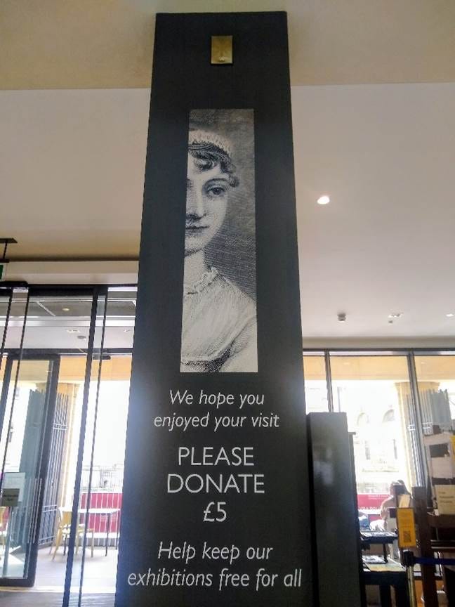 A sign with a picture of a person
AI-generated content may be incorrect. A sign with a picture of a person
AI-generated content may be incorrect.