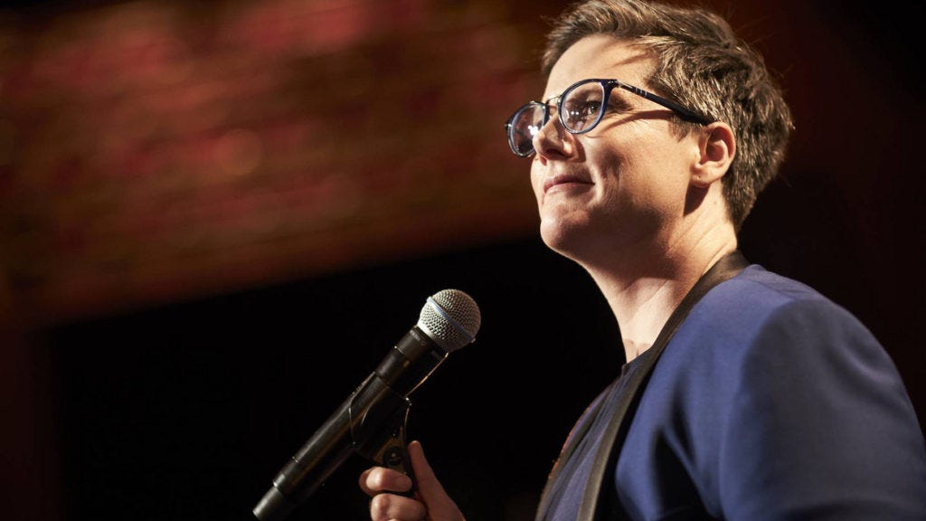 Hannah Gadsby on stage delivering Nanette