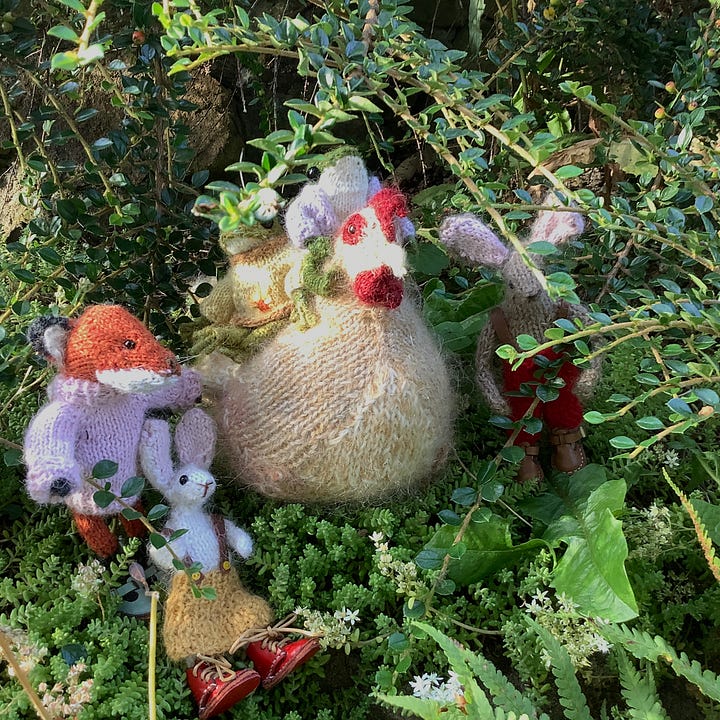 Soft toys hiding in the bushes