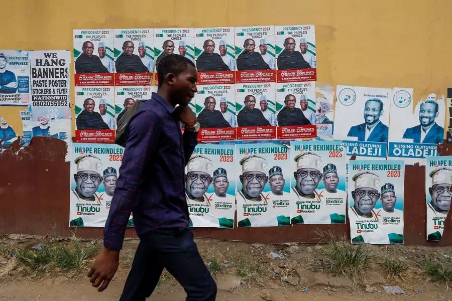 A man walks past electoral campaign posters, ahead of Nigeria's Presidential elections, in Lagos, Nigeria on January 31, 2023. A man walks past electoral campaign posters, ahead of Nigeria's Presidential elections, in Lagos, Nigeria on January 31, 2023.