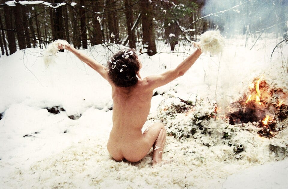 File:Naked man sitting at campfire in snow.jpg