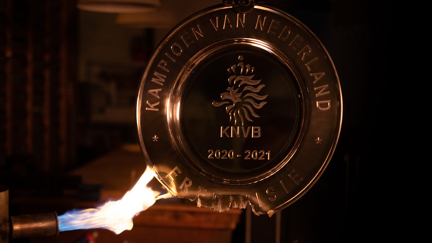 Ajax melts trophy for fans