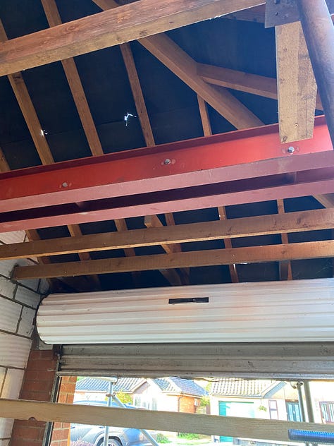 roof tiles removed from garage and steels in positon