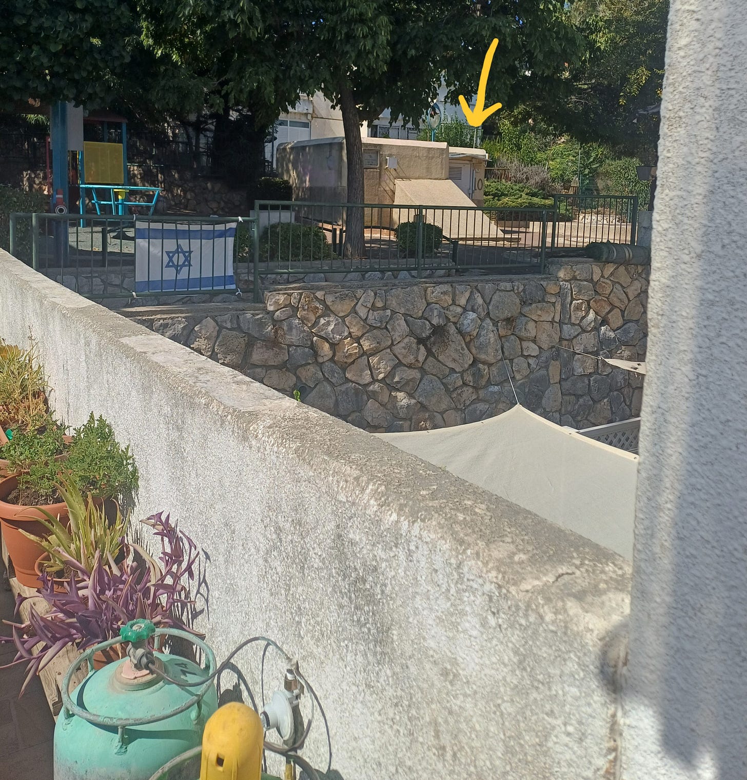 Walkway from author's front door to community shelter, near but much farther than a 5-second walk