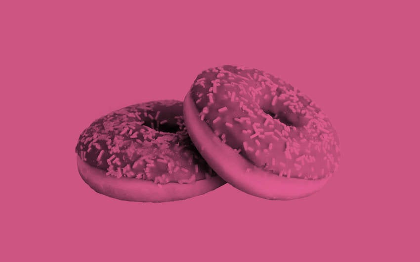 Two sweet glazed doughnuts.