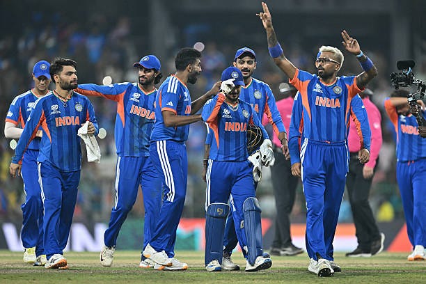 India's Hardik Pandya celebrates with teammates after their win at the end of the 2026 ICC Men's T20 Cricket World Cup group stage match between...