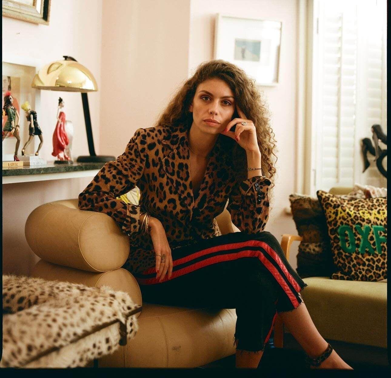 Woman sitting on a sofa