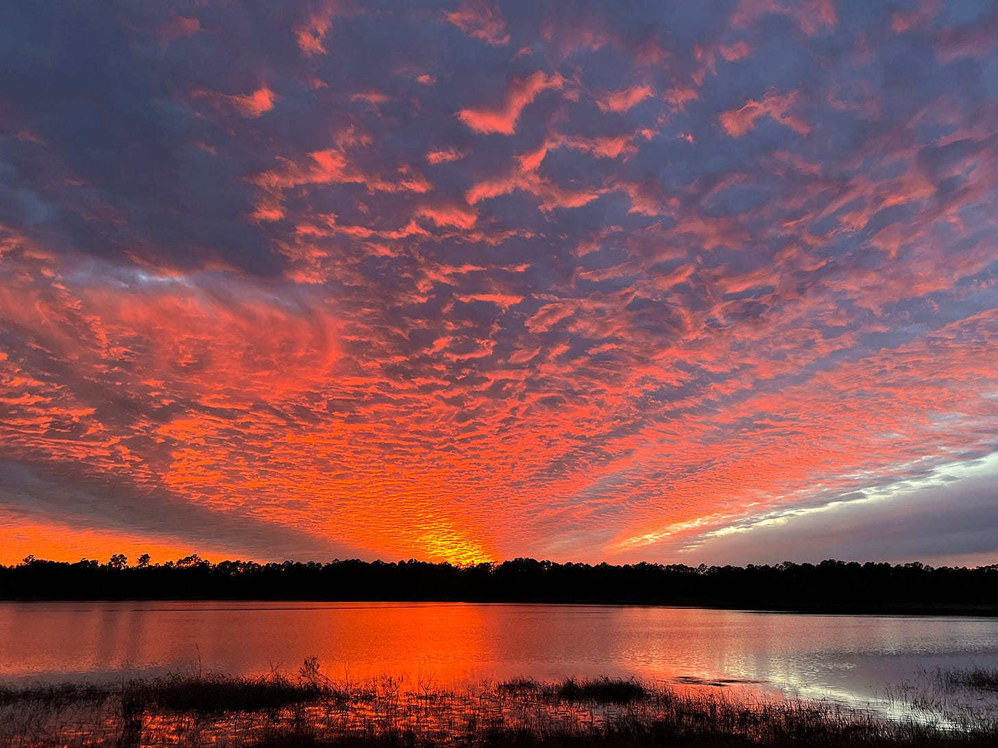 Dramatic sunset reflected in a lake