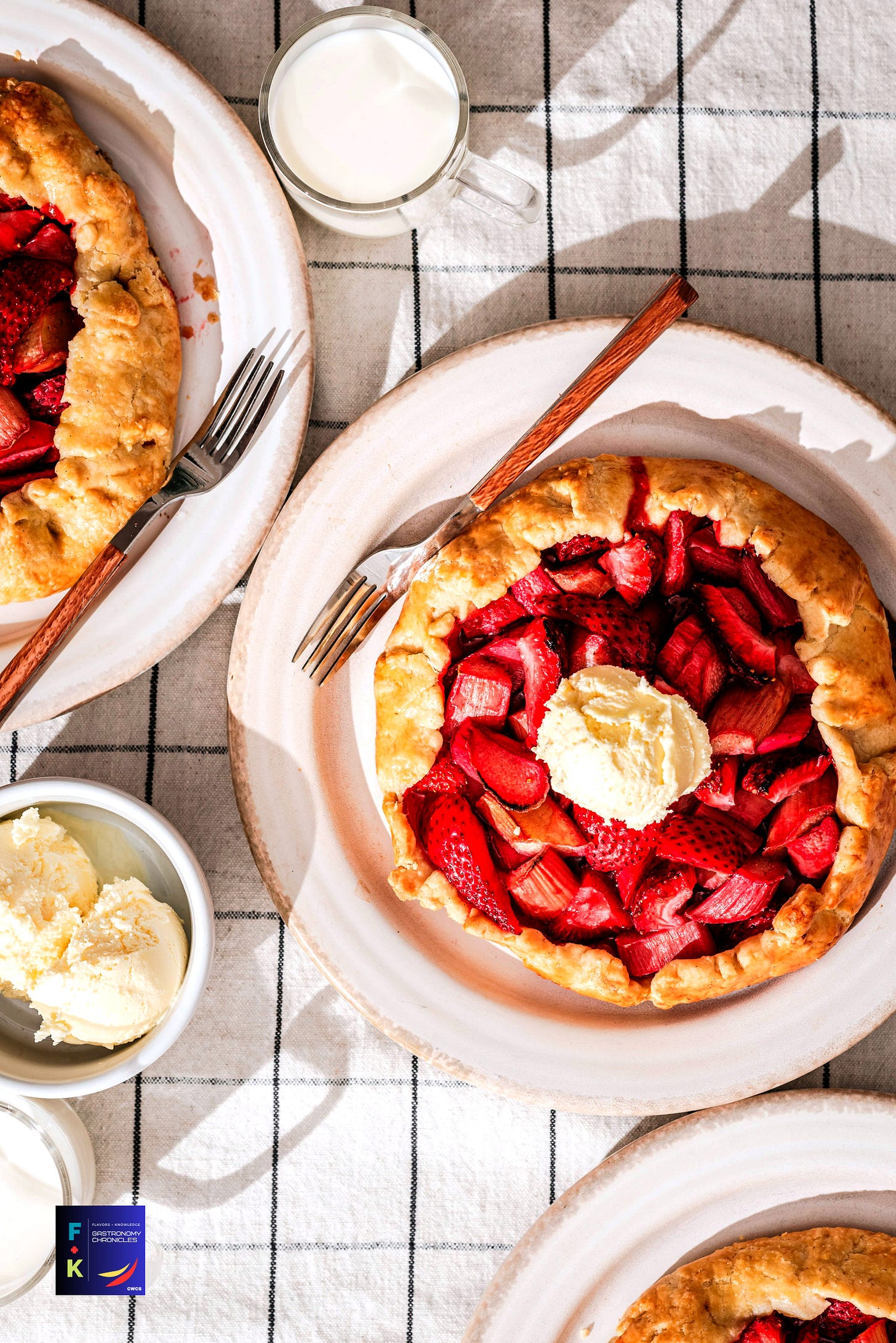 a strawberry pie with whipped cream on top