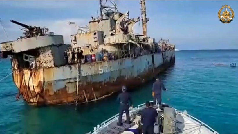M/V Lapu-Lapu approaches BRP Sierra Madre during the rotation and resupply mission conducted by the AFP in collaboration with the PCG