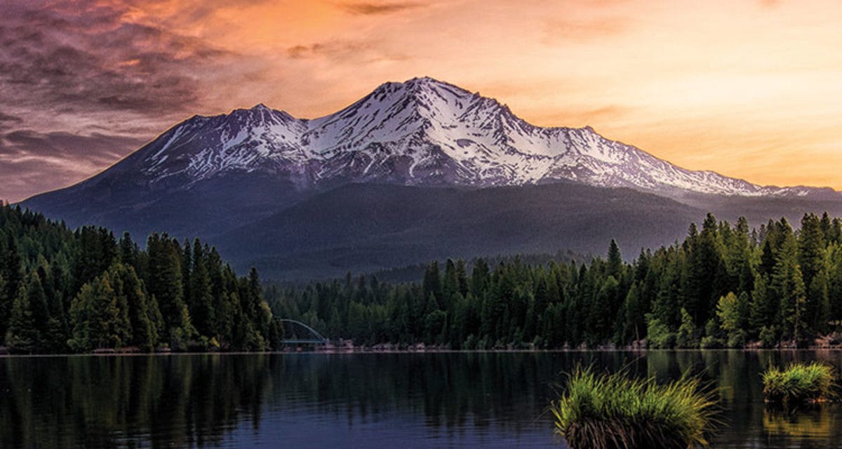 May be an image of nature, mountain and body of water