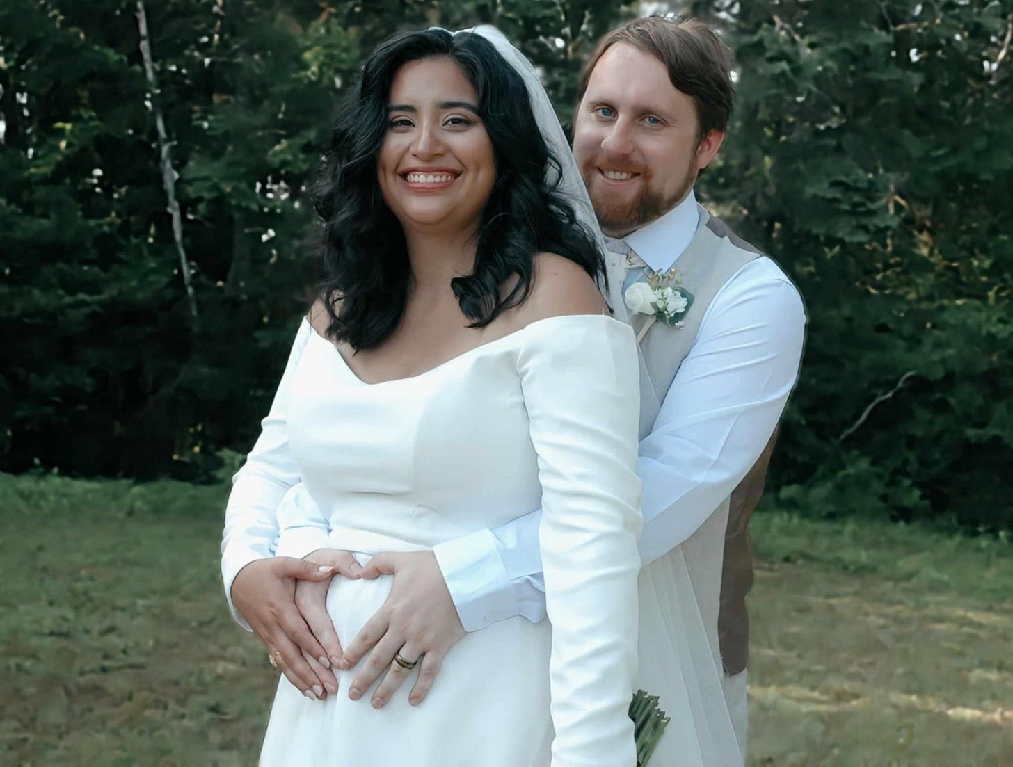 A pregnant Nikki Mahar poses for a photo with her husband. A pregnant Nikki Mahar poses for a photo with her husband.