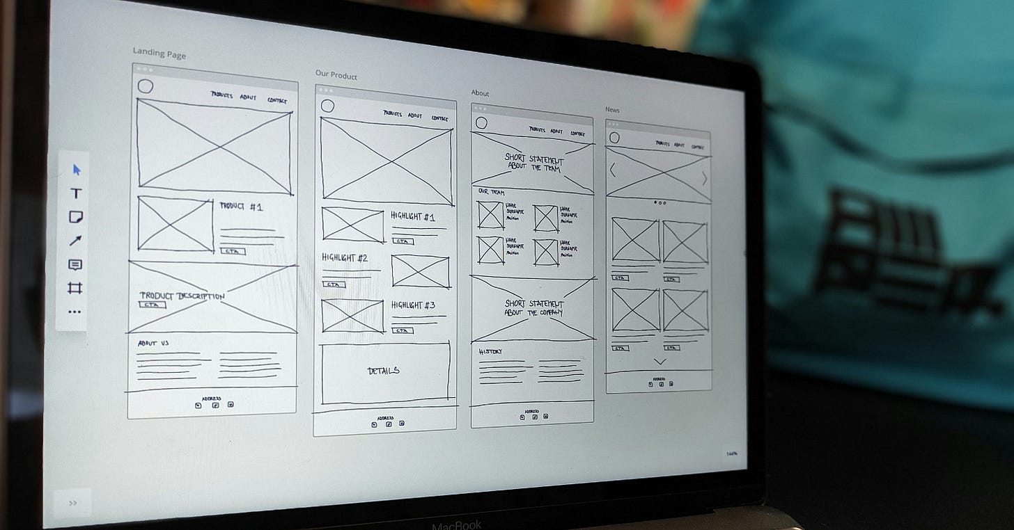 a laptop computer sitting on top of a table a laptop computer sitting on top of a table
