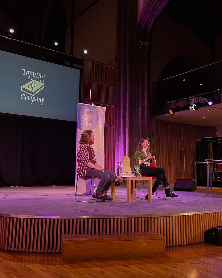 Image 1: Book event for When Among Crows by Veronica Roth in a church setting, with the book cover visible. / Image 2: M. L. Rio speaking with a Topping's bookseller at a book event for Graveyard Shift.