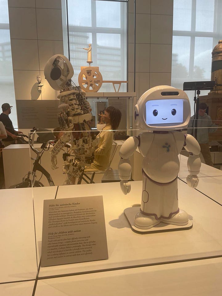 various robots in a museum room