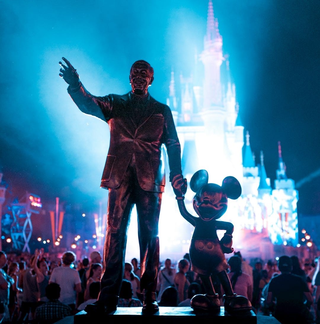 Walt Disney and Mickey Mouse statue during daytime