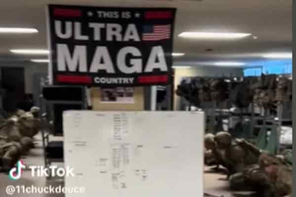 Infantry basic trainees being hazed under a Trump-inspired flag