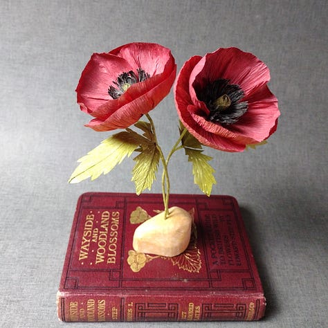 Three images of bright red paper corn poppies, from poppies with real poppy seed head centres to poppies coloured using natural dye