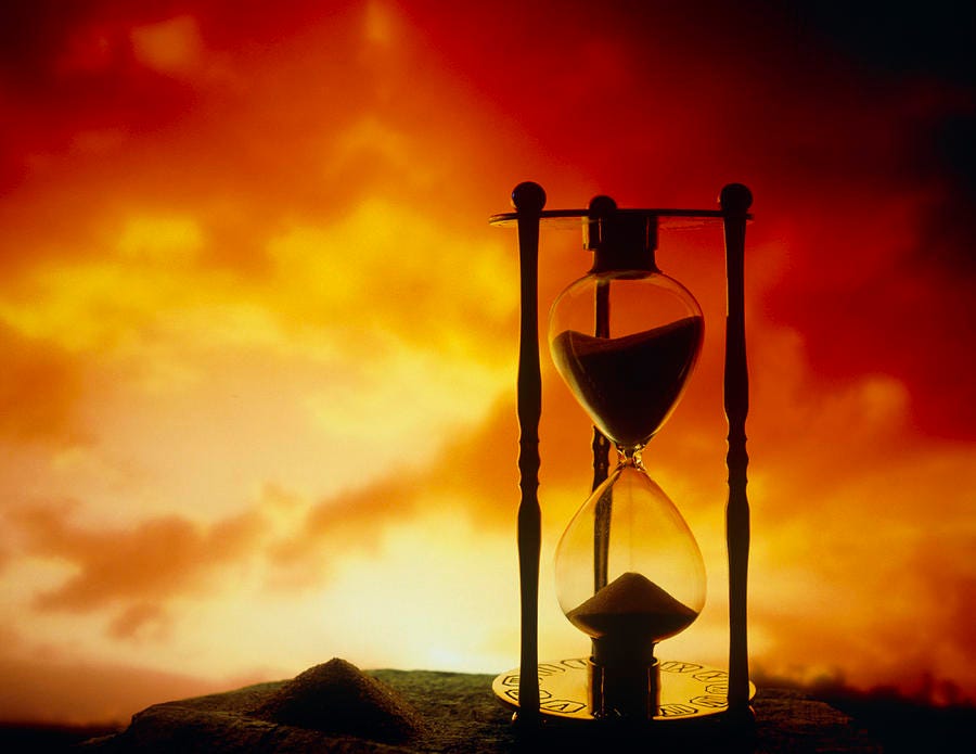 Hour-glass by Tony Craddock / Science Photo Library