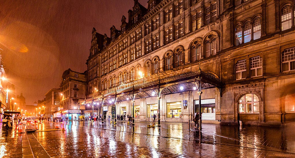 Photograph of Glasgow Central Station and Gordon Street in the rain Photograph of Glasgow Central Station and Gordon Street in the rain