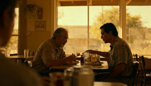 A couple of men sitting at a table

AI-generated content may be incorrect.