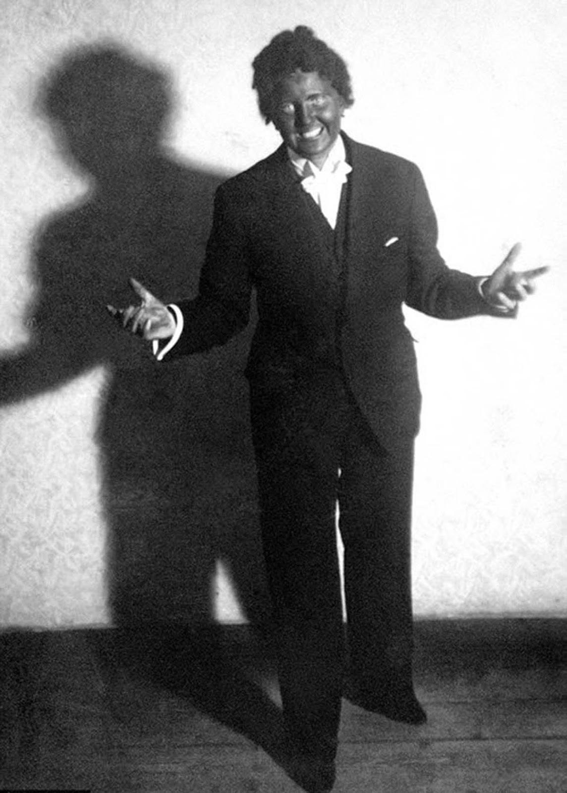 Eva Braun in blackface, a controversial portrayal from her private collection. Eva Braun in blackface, a controversial portrayal from her private collection.