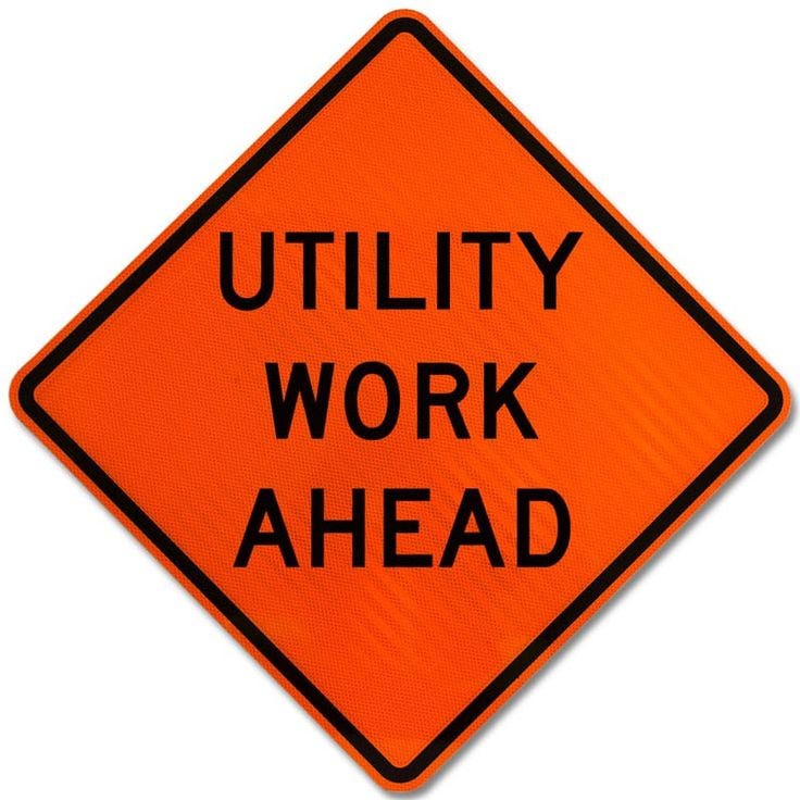 This may contain: an orange utility work ahead sign on a white background This may contain: an orange utility work ahead sign on a white background