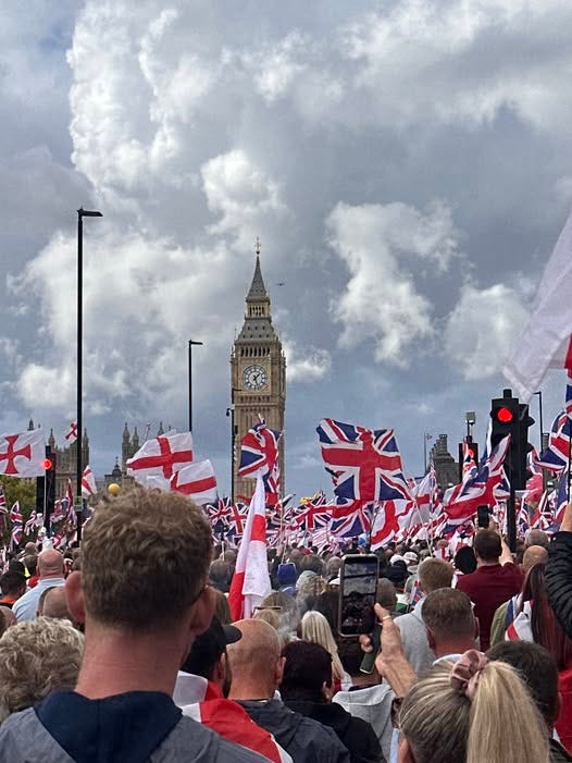 May be an image of 2 people and crowd